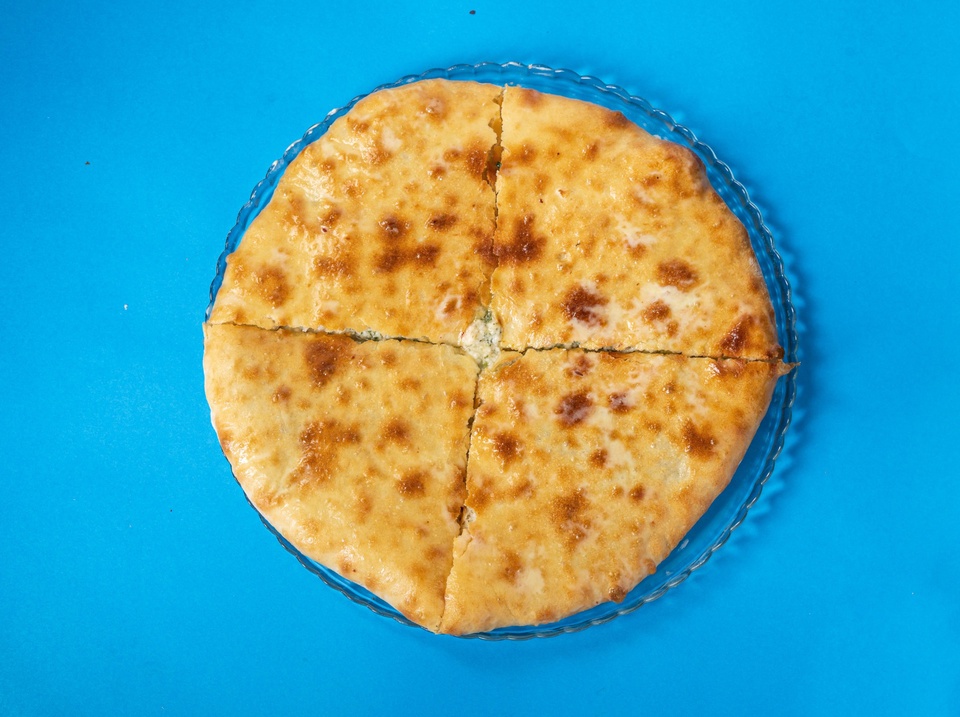 Осетинский пирог с сыром и зеленью - 480 ₽, заказать онлайн.
